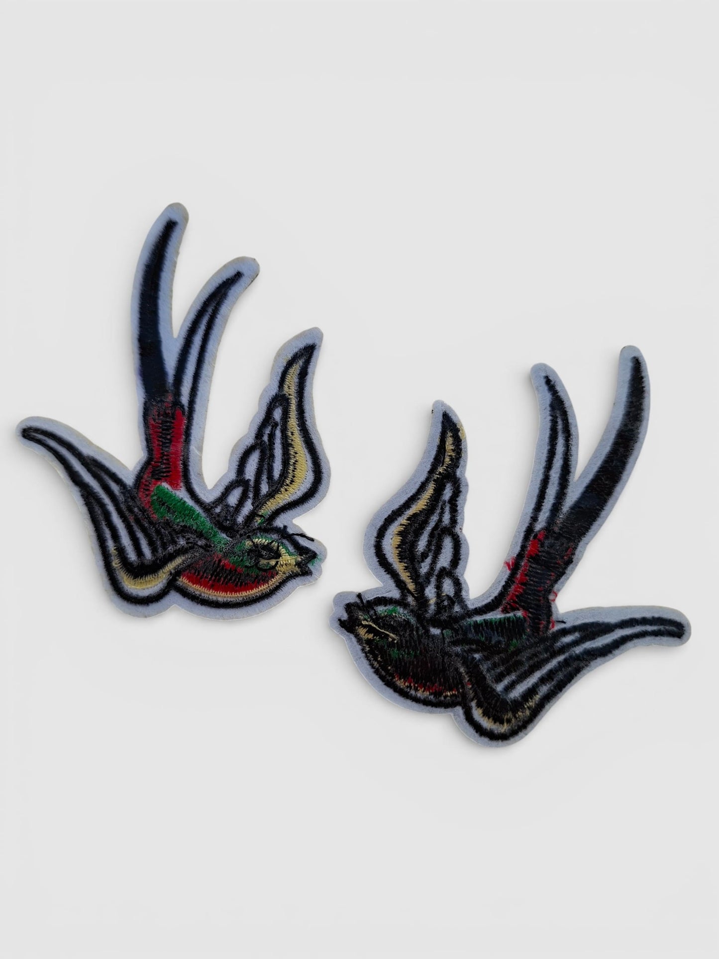 Parte de atrás parche golondrinas, tatuaje tradicional.