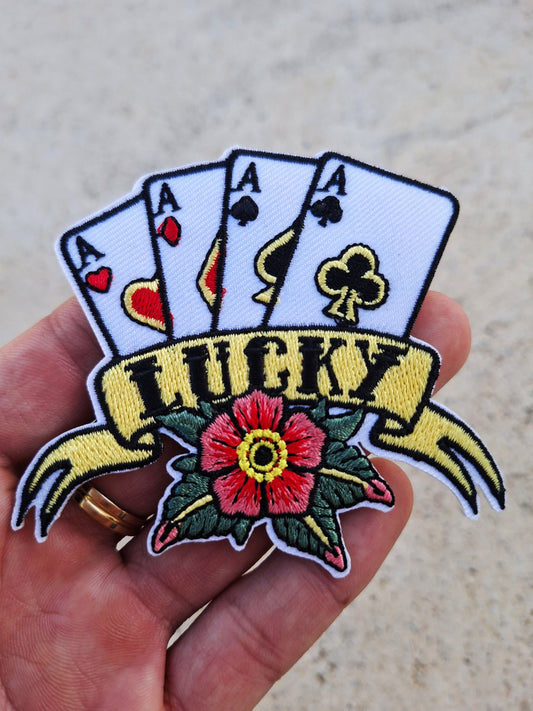 Parche exclusivo cartas AS corazones y flor fortuna.