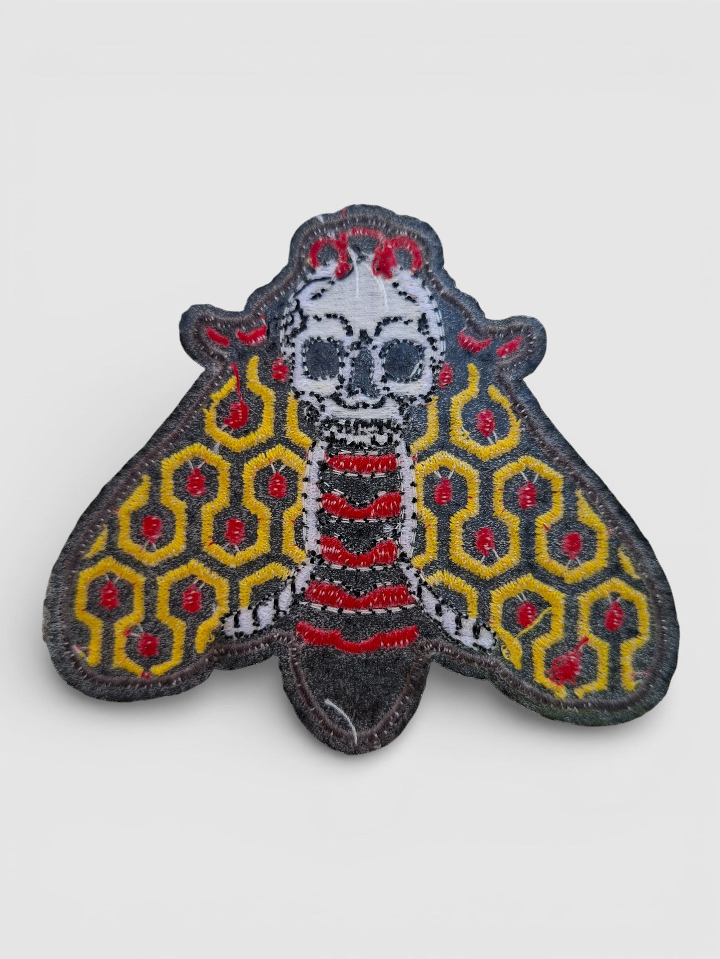 Parte trasera parche de tela con polilla detallada en tonos old school, ideal para chaquetas, mochilas o cualquier accesorio