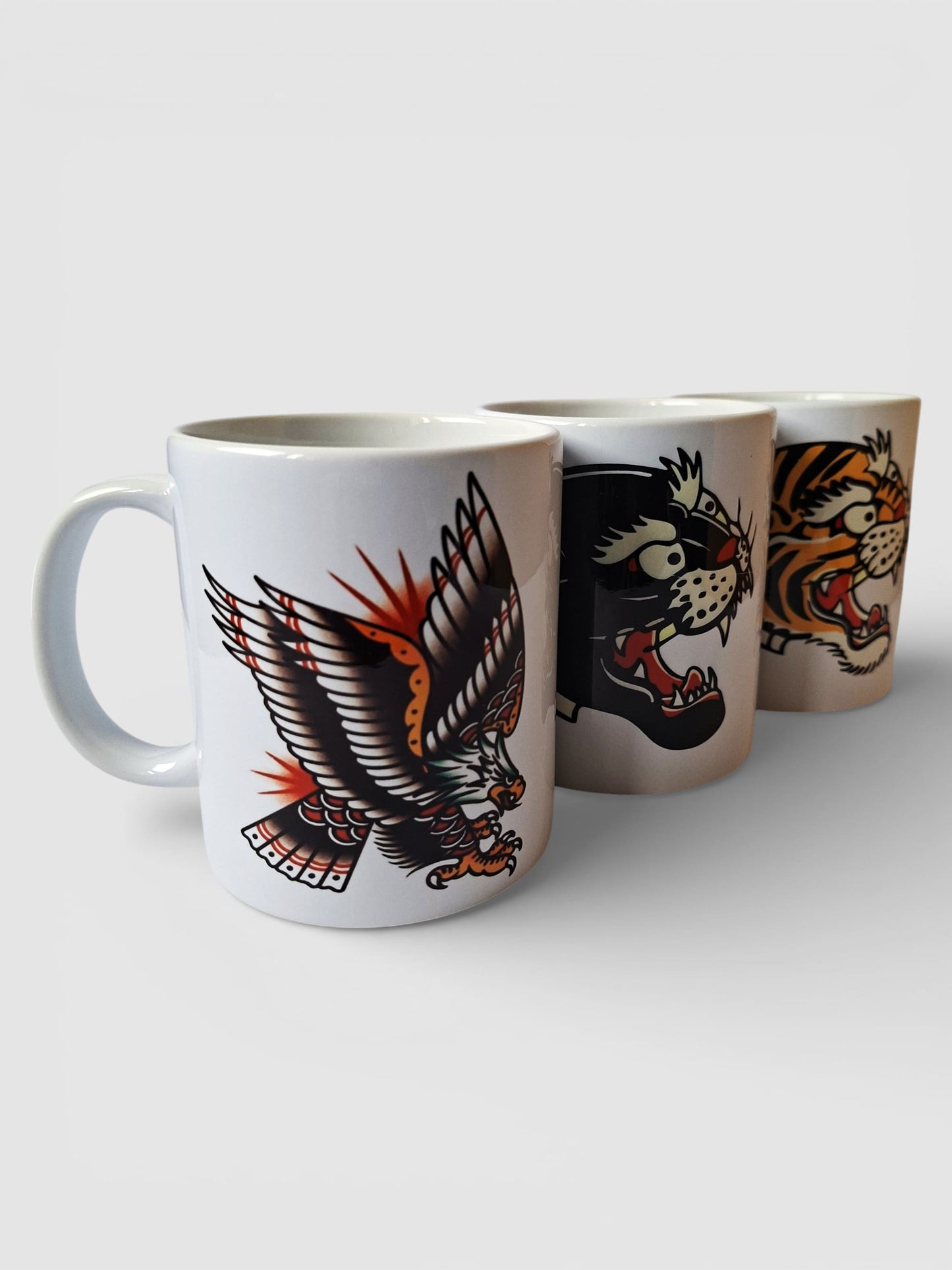 Pack de 3 tazas estilo old school con diseños tattoo: tigre, pantera y águila. Ideal como regalo.
