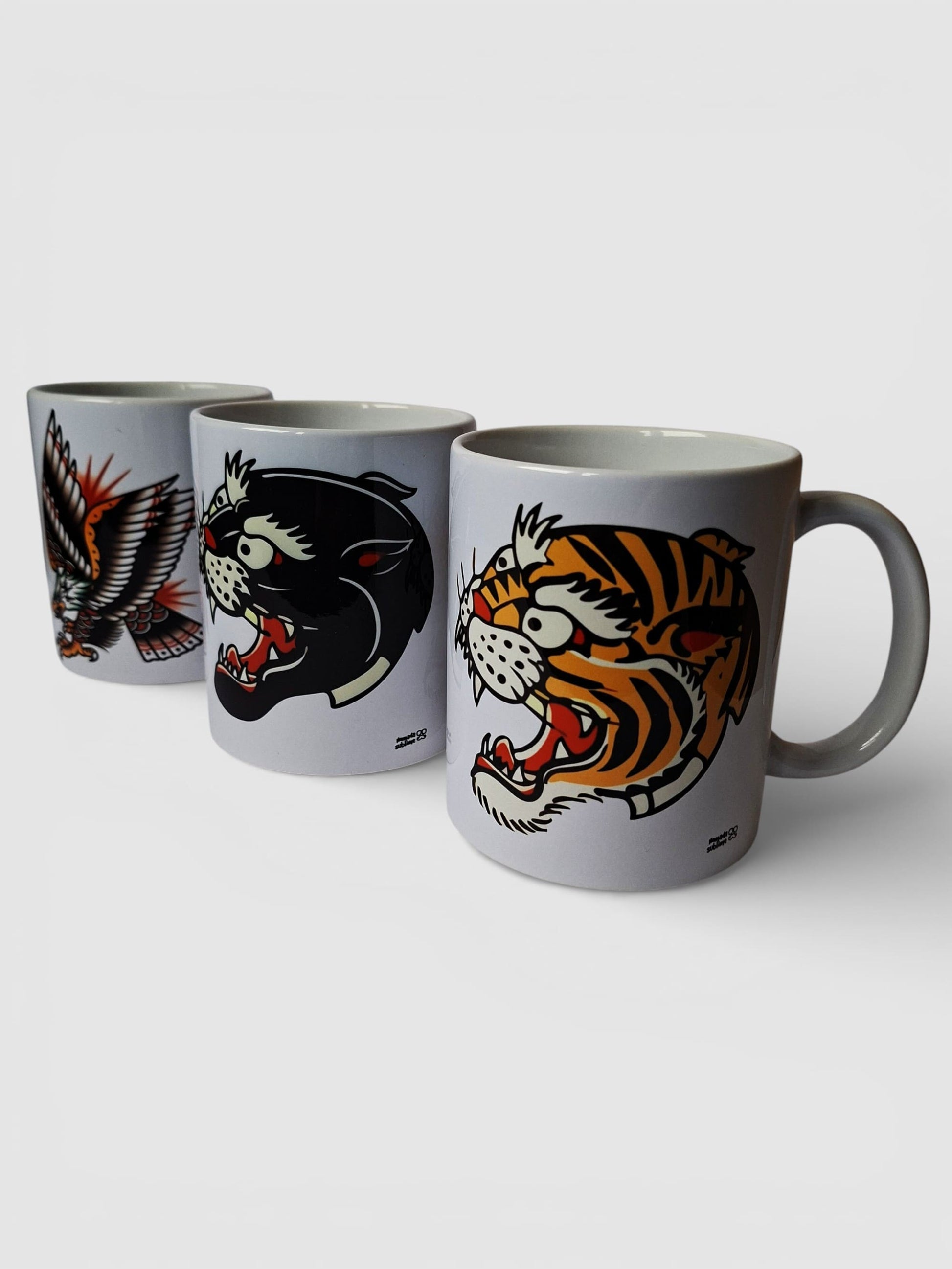 conjunto de tres tazas estilo tattoo old school americano, diseño de aguila, pantera y tigre.
